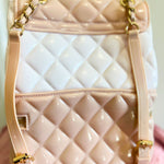 Quilted pink and white Classy Jelly Backpack Purse with gold chain straps