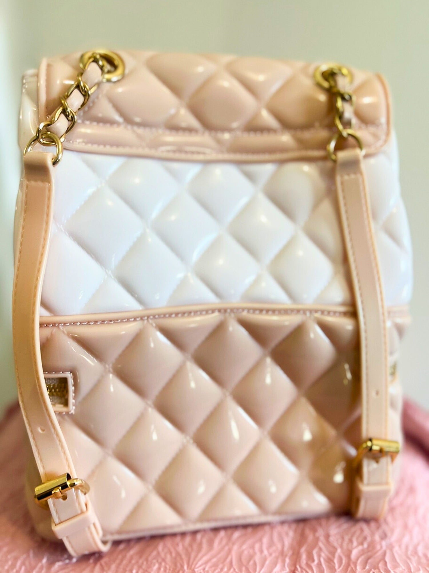 Quilted pink and white Classy Jelly Backpack Purse with gold chain straps