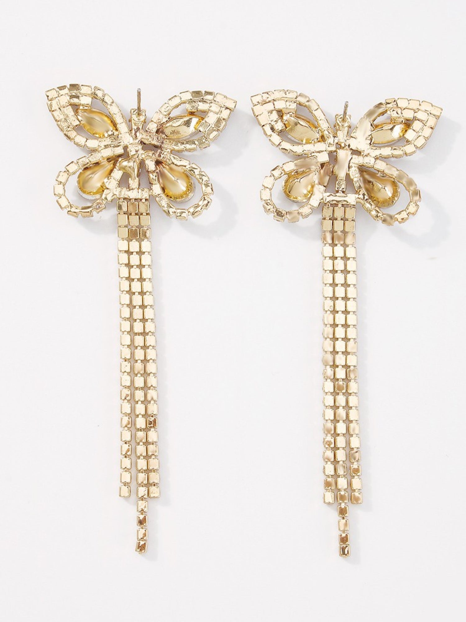 Gold butterfly-shaped Diamond Flutter Earrings with dangling chain tassels