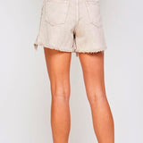 Beige Facing Trouble Denim Shorts with frayed edges and high waist button detail