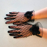 Elegant black lace gloves with floral accents to complement your Fleur Evening gown