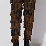 Back view of The Fringe Thigh High Boots by Azalea Wang showcasing layered fringe and gold studs for a dramatic, high-fashion footwear look.
