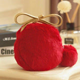 Red furry pom pom with gold bow on The Furry Pom Pom Micro Purse