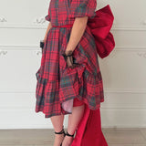 Red and gray plaid dress with tiered ruffles, perfect for bow lovers, 24 inches long