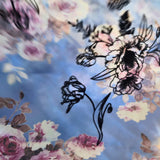 Floral pattern with pink and white blossoms on a blue backdrop for High Priestess Cape