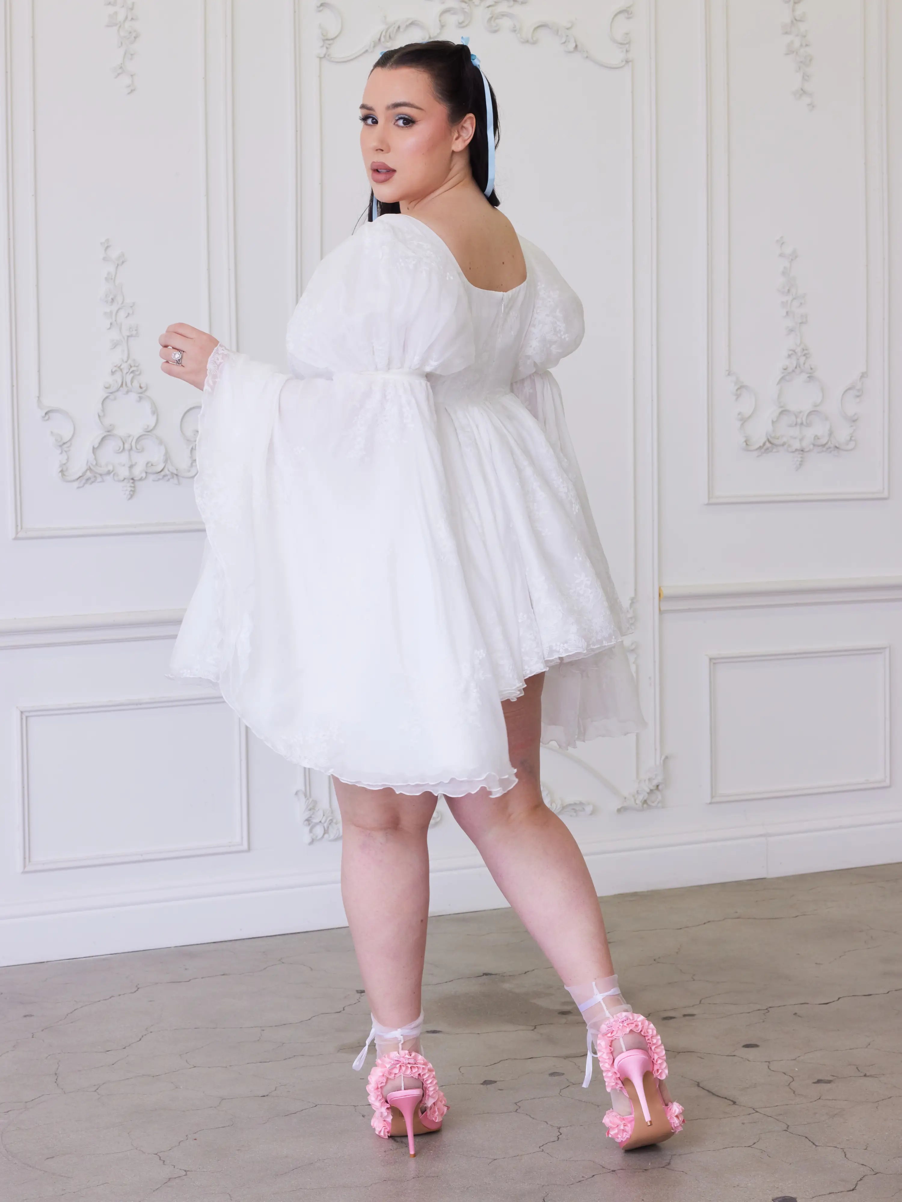 Ivory Fairy Puff Dress featuring a flowy mini style with voluminous sleeves and loose silhouette