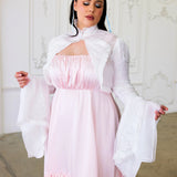 Pink and white dress with bell sleeves paired with the Ivory Lady Elizabeth Bolero