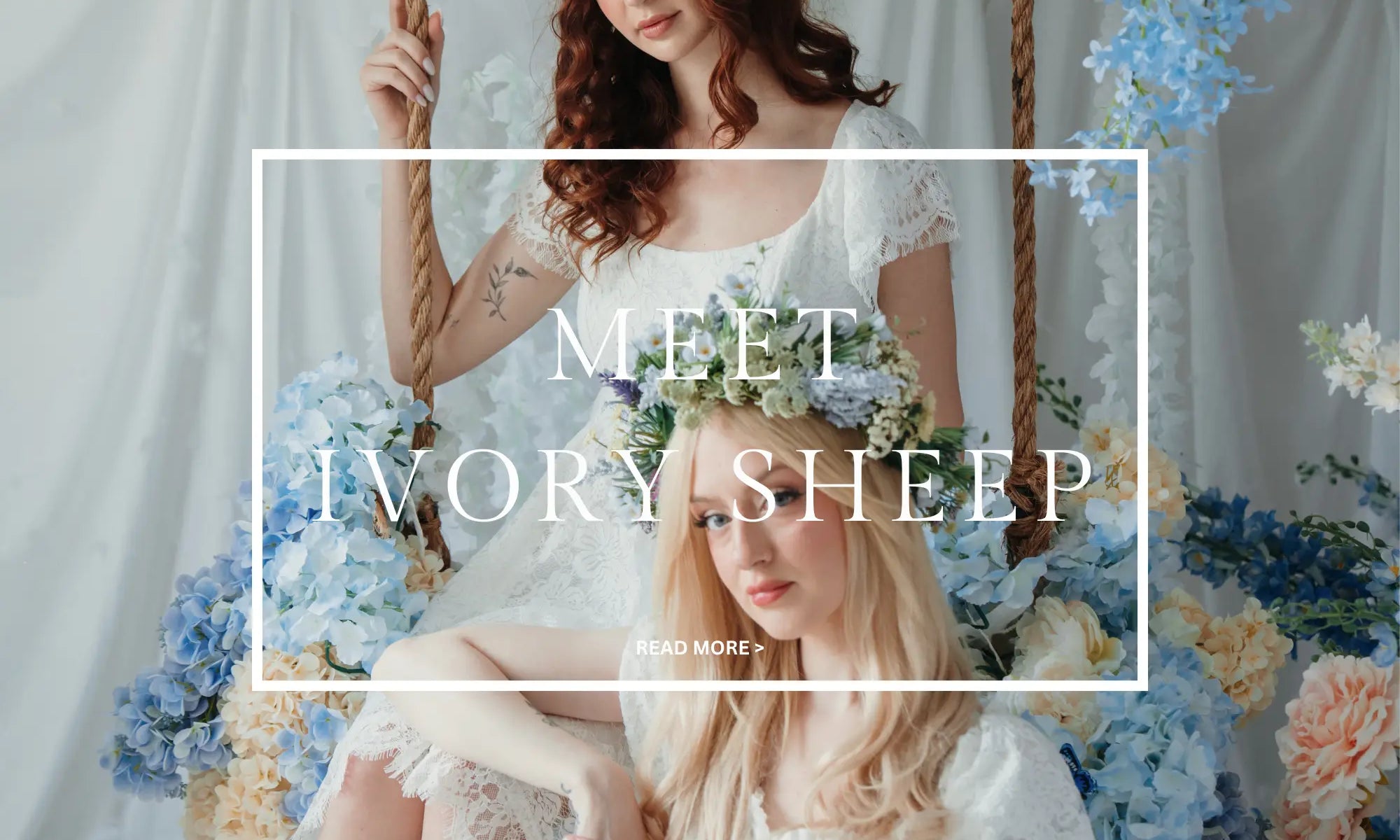 Two women in white lace maxi dresses sitting on a swing surrounded by flowers with 'Meet Ivory Sheep' text overlay.