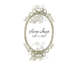 Ivory Sheep gift card with ornate gold borders and florals.