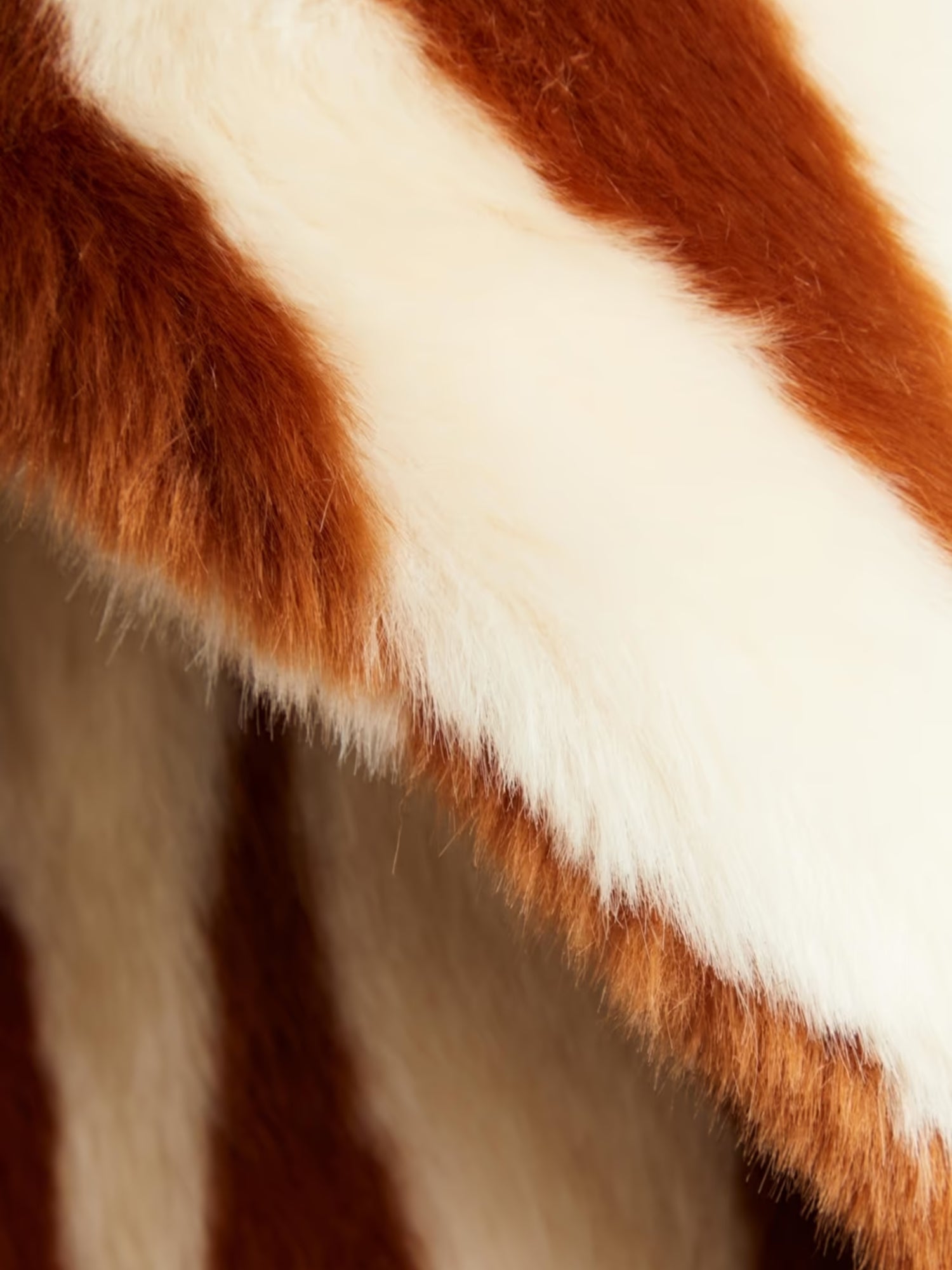 Reddish-brown and white fur in Katie Faux Fur Chestnut Tiger Duster Coat design