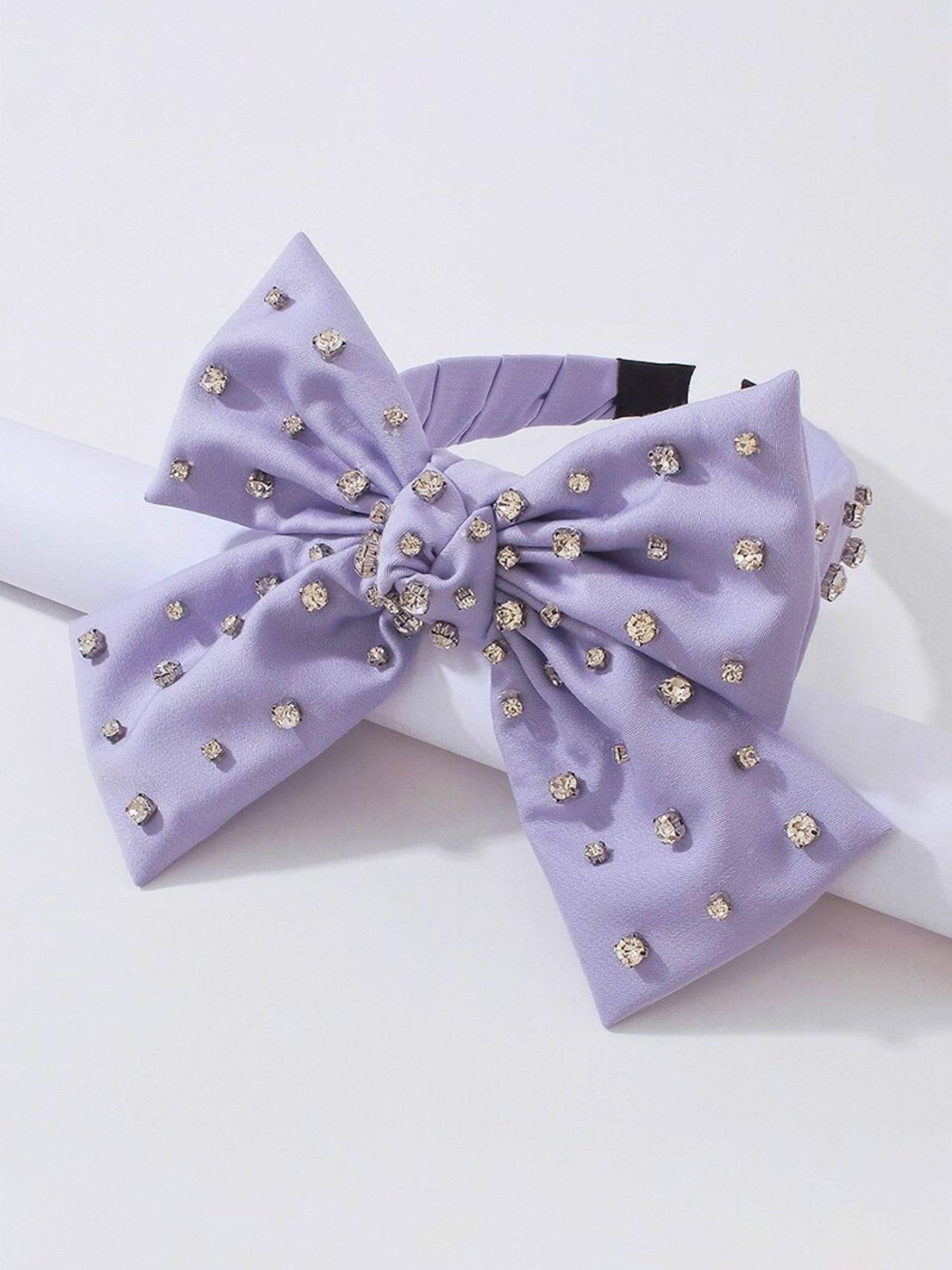 Lavender Bow Headband featuring pearl-like beads for a chic hairstyle accessory.