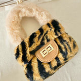 Fluffy Leopard Faux Fur Micro Handbag with tiger-like print and pink furry handle