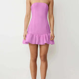 Strapless pink mini dress with ruffled hem from The Lia Mini Dress collection