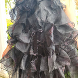 Ruffled layered gray feather mini dress with sheer fabric and voluminous skirt