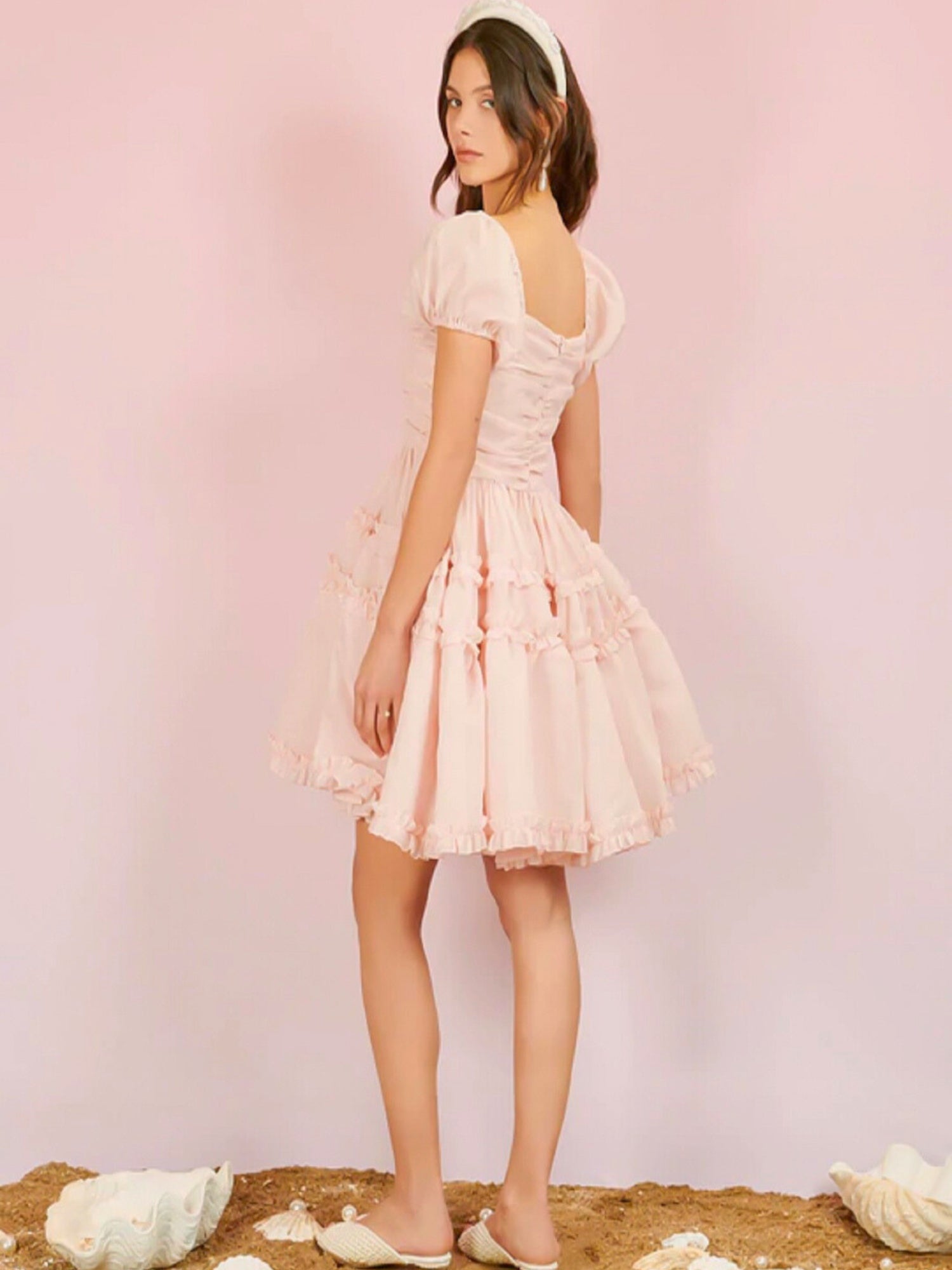 Pale pink lace Lillia Ruffle Mini Dress with short sleeves and full skirt design