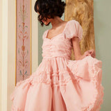 Pink Lillia Ruffle Mini Dress featuring short sleeves and a full skirt