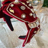 Ornate red velvet Blair Headband boasts exquisite details with pearls and jeweled embellishments