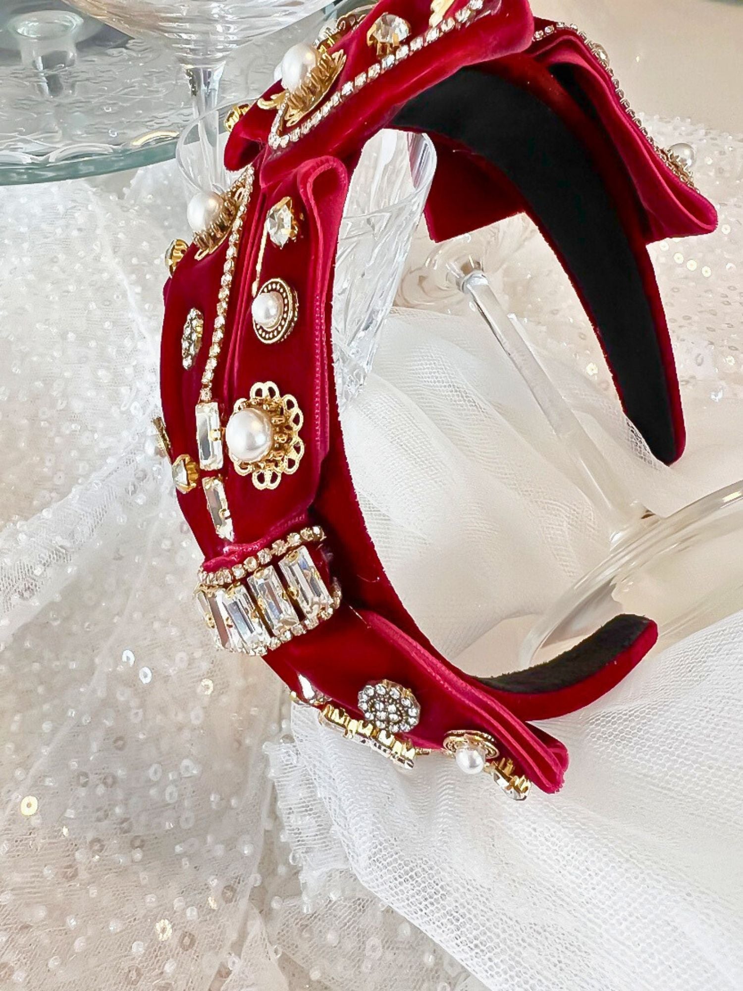 Ornate red velvet Blair Headband boasts exquisite details with pearls and gold embellishments