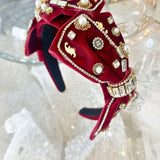 Ornate red velvet Blair Headband boasts exquisite details with pearls and crystal embellishments