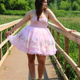 Pink strapless tulle dress adorned with floral embellishments, perfect Magnolia Fairy Puff