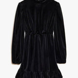 Midnight Velvet Mini Dress featuring sweetest black velvet with gathered waist and ruffled hem