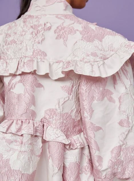 Ruffled pink and white floral Misty Jacquard Bow Dress with a stylish collar