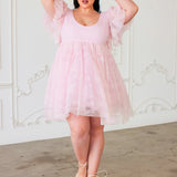 Pink Candy Cherub Dress featuring flowy design, sheer sleeves, and high-low hemline