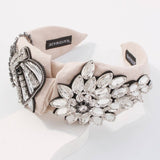 Ornate Queenship Cotton Headband with crystal floral designs for gowns and grand bow sashes.