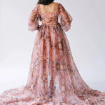 Back view of the Ode to Jove Twilight Reverie Ball Gown showcasing trailing organza and baroque-inspired print on sheer fabric.