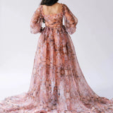 Back view of the Ode to Jove Twilight Reverie Ball Gown showcasing trailing organza and baroque-inspired print on sheer fabric.