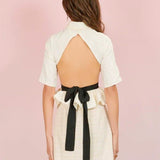 White Seashore Cropped Blouse with open back and grand bow sash in black ribbon tie