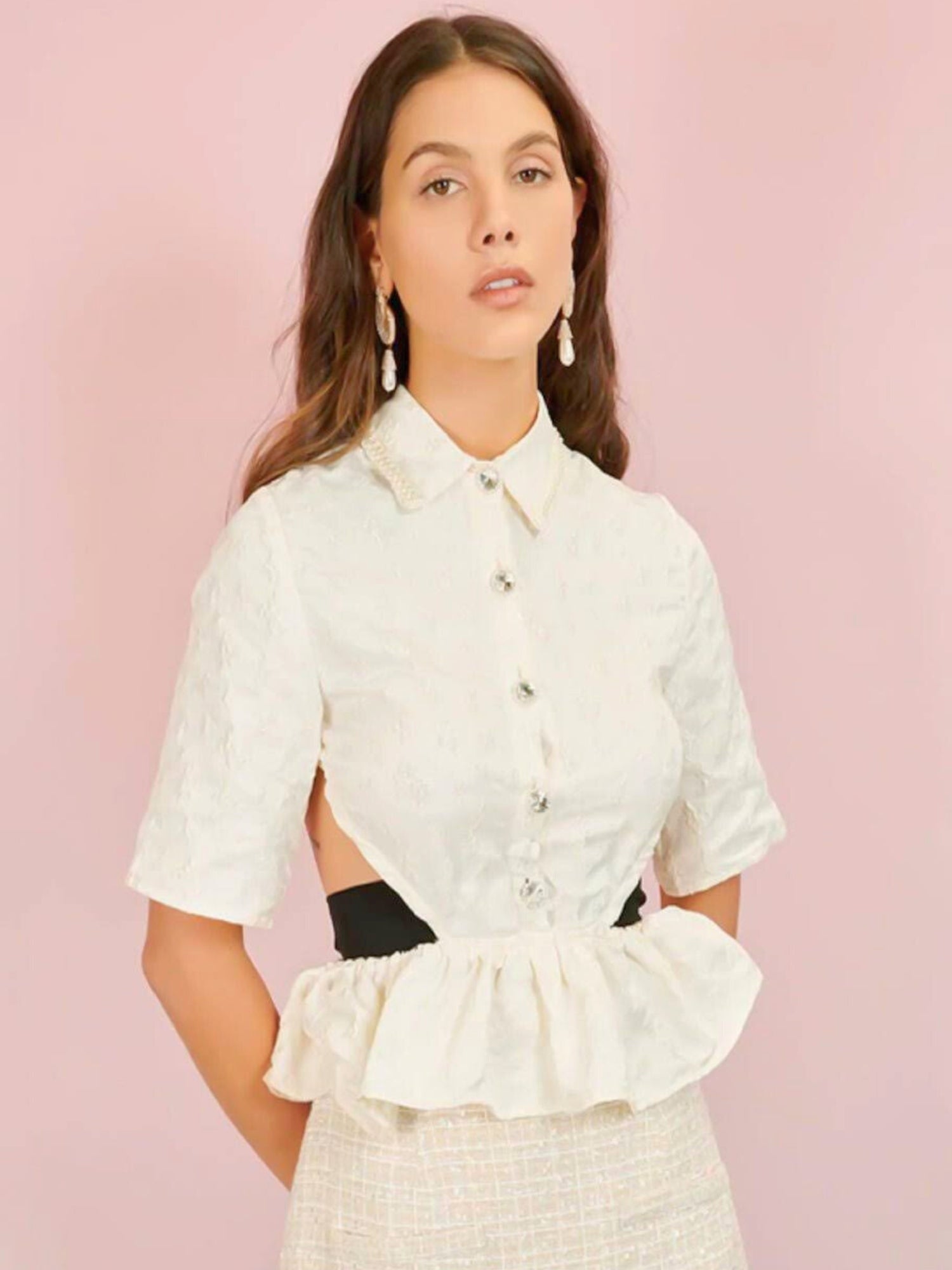 Woman in Seashore Cropped Blouse with peplum waist and black belt for stylish flair