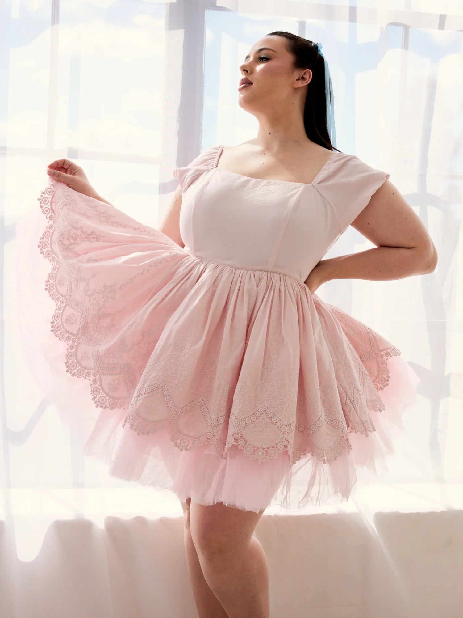 Soft pink tulle dress with fitted bodice and flared skirt from The Soft Pink Blossom Dress