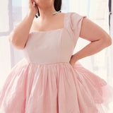 Soft Pink Blossom Dress featuring a fitted bodice and full tulle skirt