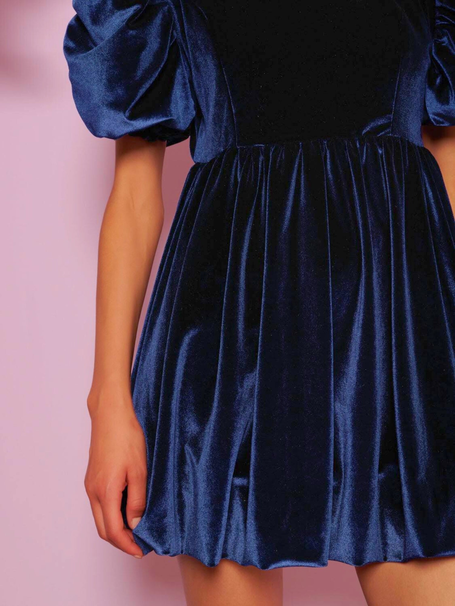 Navy blue velvet mini dress with puffed sleeves and gathered skirt from Spell Velvet