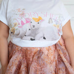 Close-up of The Little Lamb Tee highlighting detailed lamb and wildflower print, perfect for whimsical and cozy cottagecore outfits.