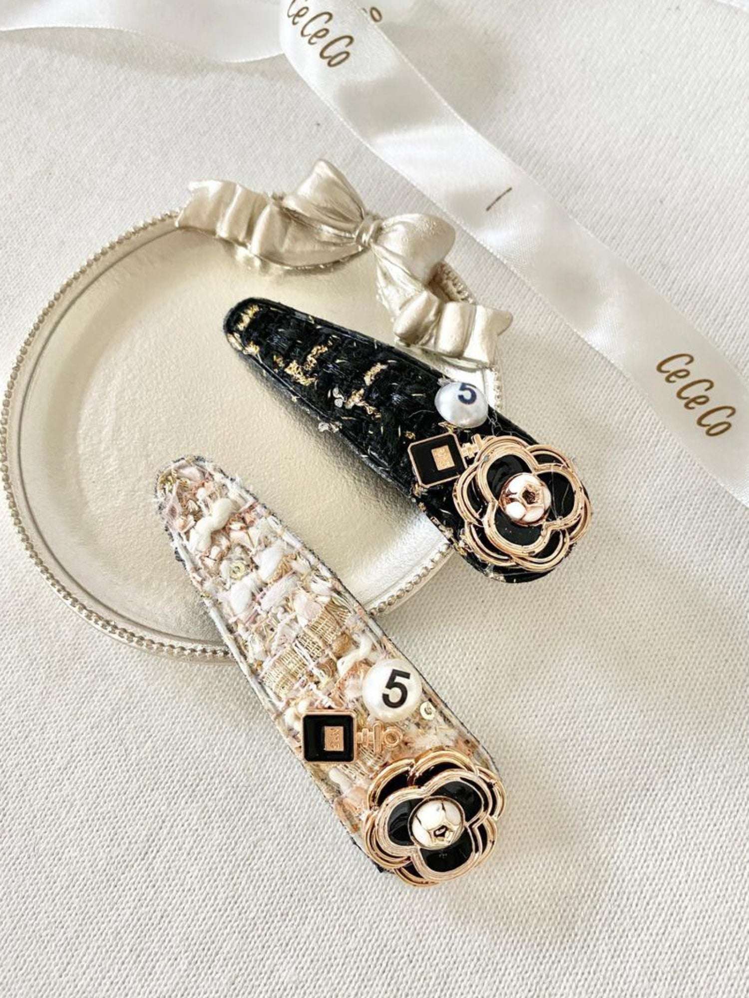 Decorative Tweed Peony Hair Clips with floral designs and rhinestone accents.