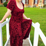 Burgundy Velvet Viola Dress featuring short sleeves and a flowing skirt