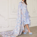 Flowing Wild Bloom Priestess Cape over a light blue dress with a long train