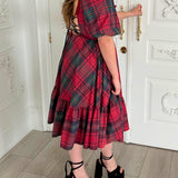 Red and black plaid Winter Tartan Josephine Midi Dress with ruffled hem and short sleeves