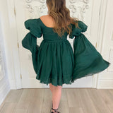 Emerald green Woodland Fairy Puff dress featuring dramatic puff sleeves and a flared skirt